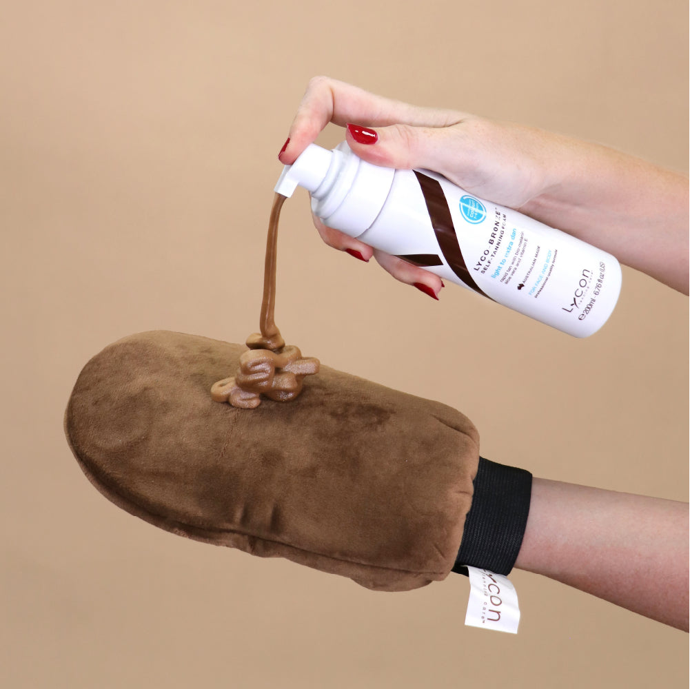 Photo of LYCO-BRONZE Self-Tanning Foam being pumped onto Application Mitt