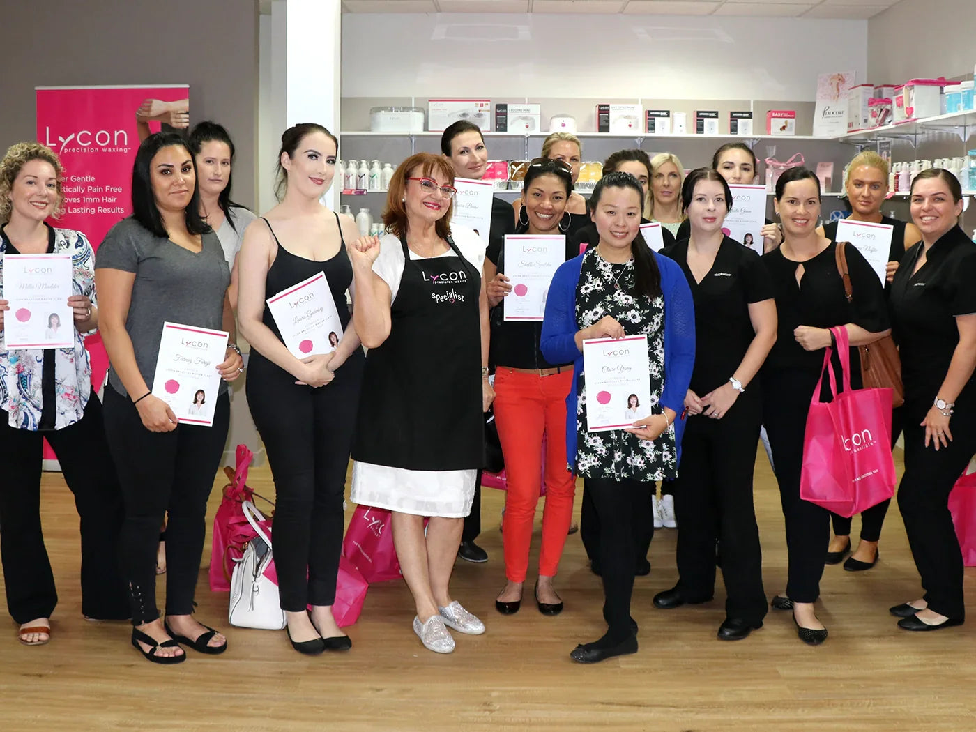 A group photo of people smiling and holding their certificate for attending the first Brazilian master class with Lydia at Pinkenba HQ