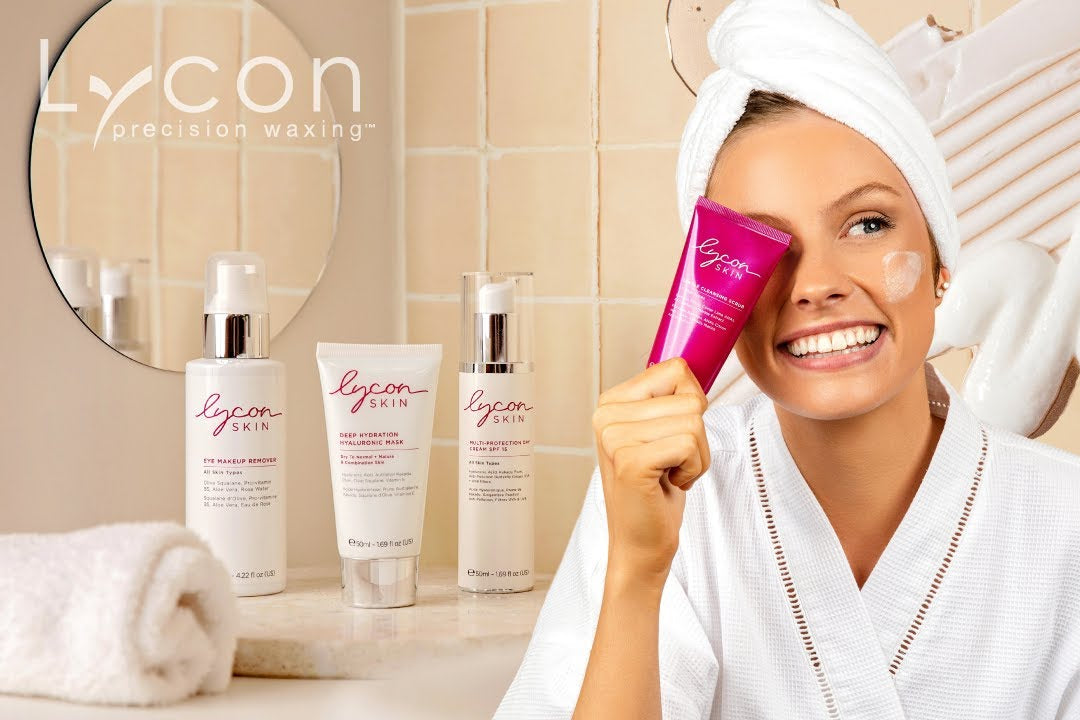 Woman holding a pink product with LYCON Skin products in the background